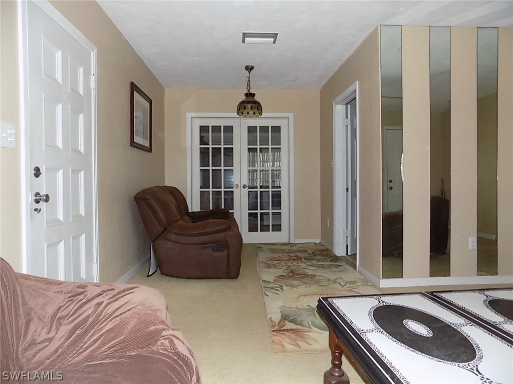 2105 Pineview Road Fort Myers, FL 33901 - Photo 7 of 22 a living room with furniture and a window