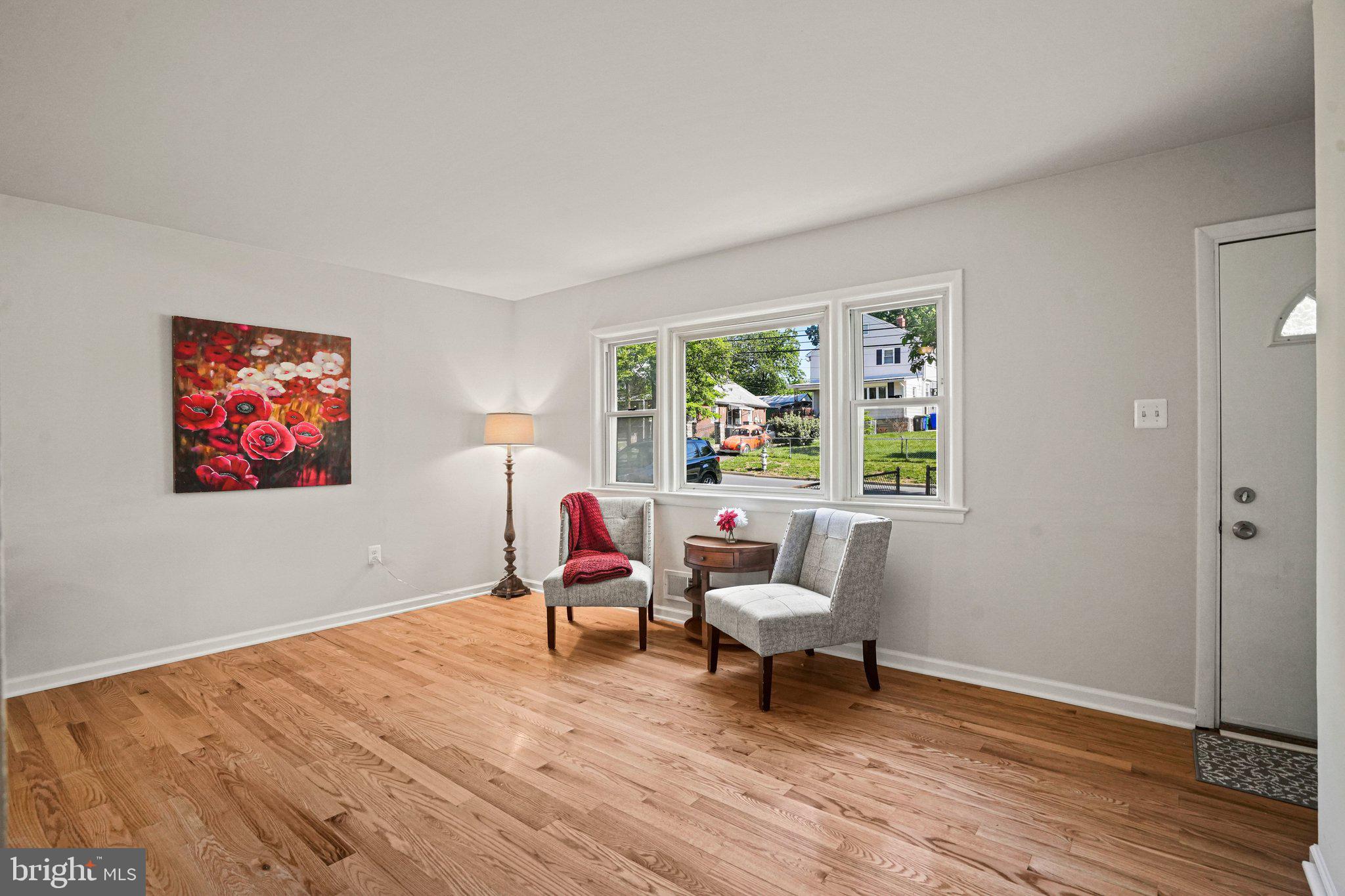 616 Ritchie Avenue Silver Spring, MD 20910 - Photo 3 of 37 a living room with furniture and a window