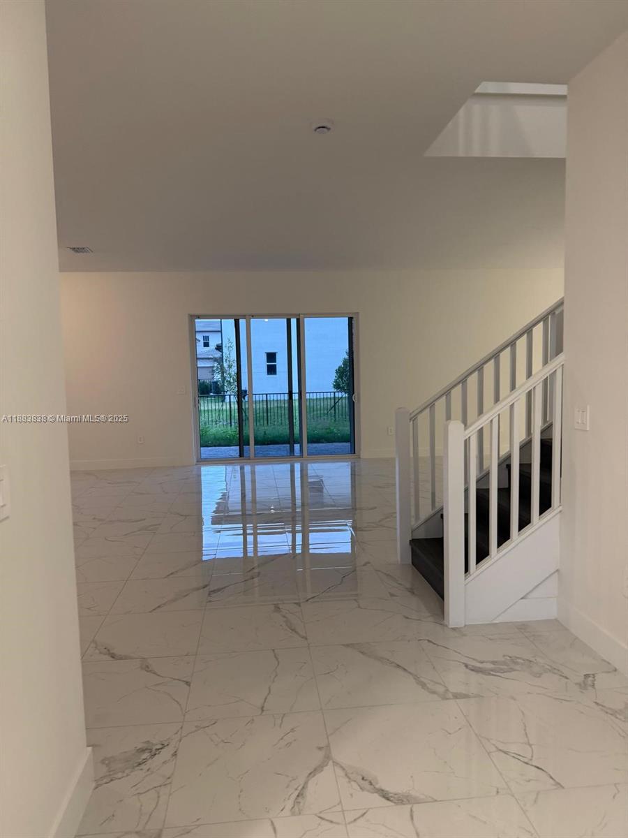 12303 Southwest 44th Street Davie, FL 33330 - Photo 13 of 42 a view of a big room with windows