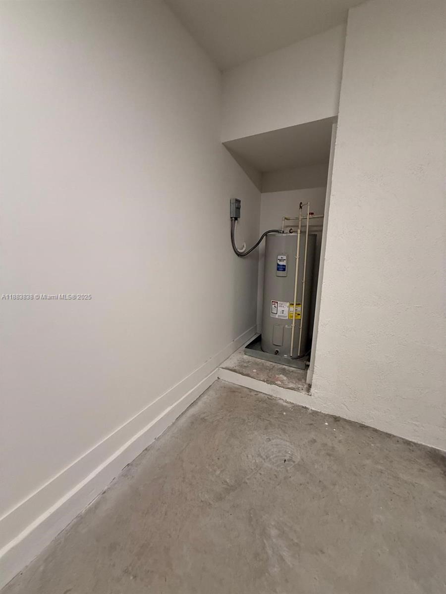 12303 Southwest 44th Street Davie, FL 33330 - Photo 21 of 42 an empty room with a door