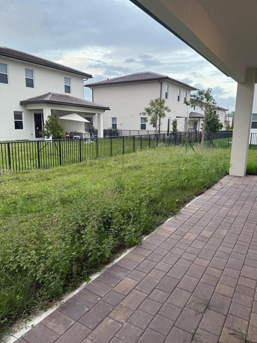 12303 Southwest 44th Street Davie, FL 33330 - Photo 39 of 42 a front view of a house with a yard