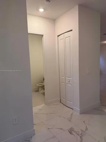 a view of a livingroom with furniture