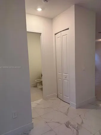 a view of a livingroom with furniture