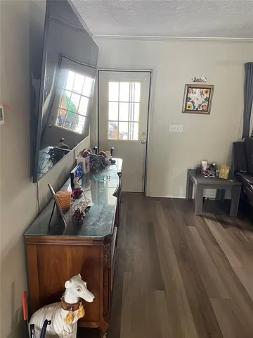 a living room with furniture and window