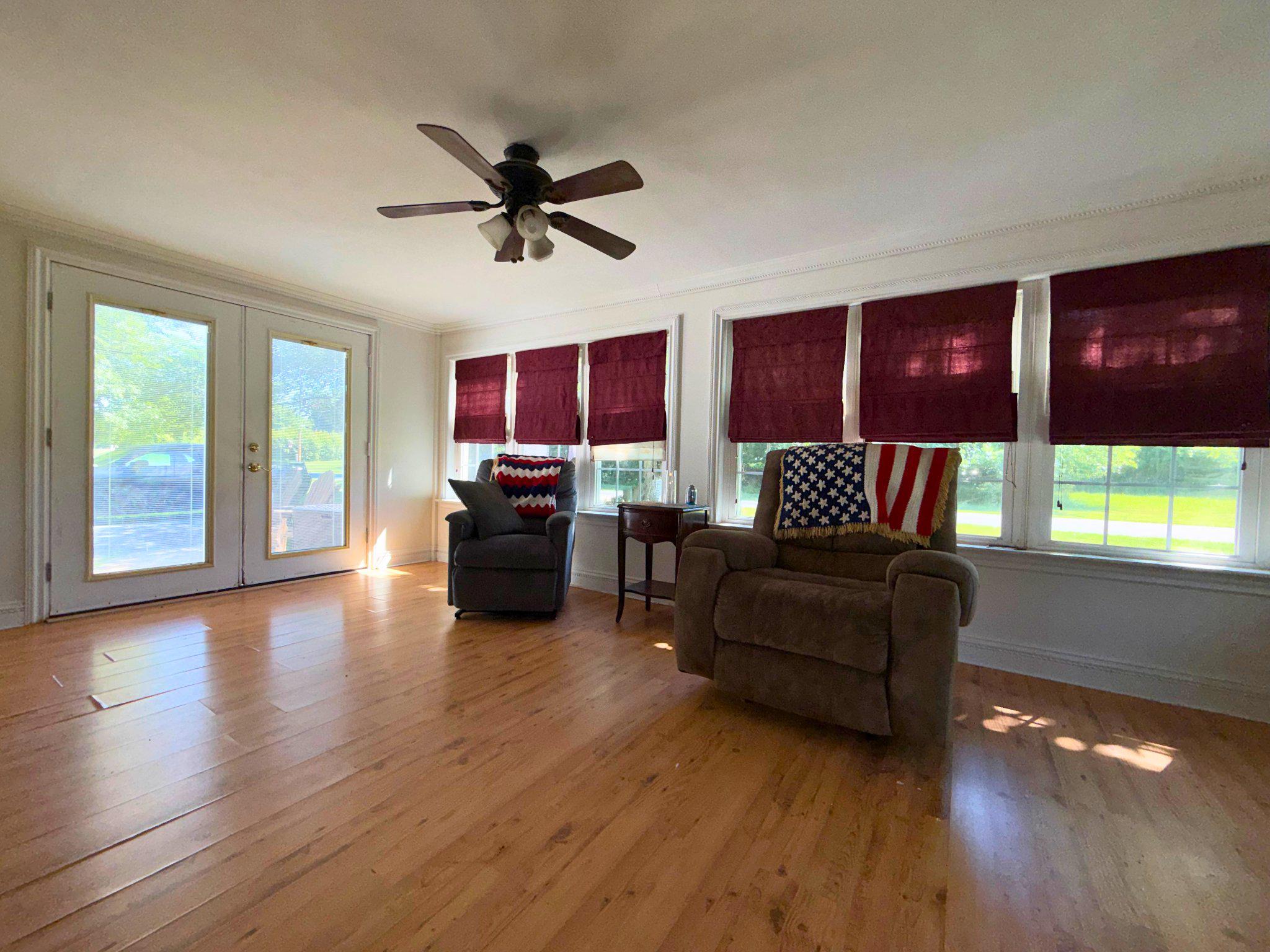 4818 Piney Neck Road Rock Hall, MD 21661 - Photo 8 of 24 a living room with furniture and a window