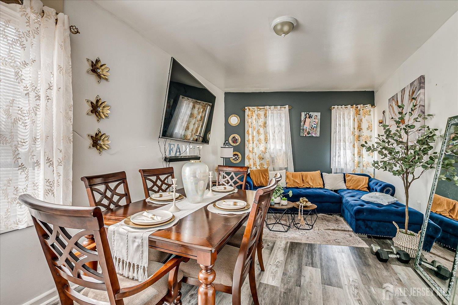 768 State Street Perth Amboy, NJ 08861 - Photo 17 of 35 a view of a livingroom with furniture window and wooden floor