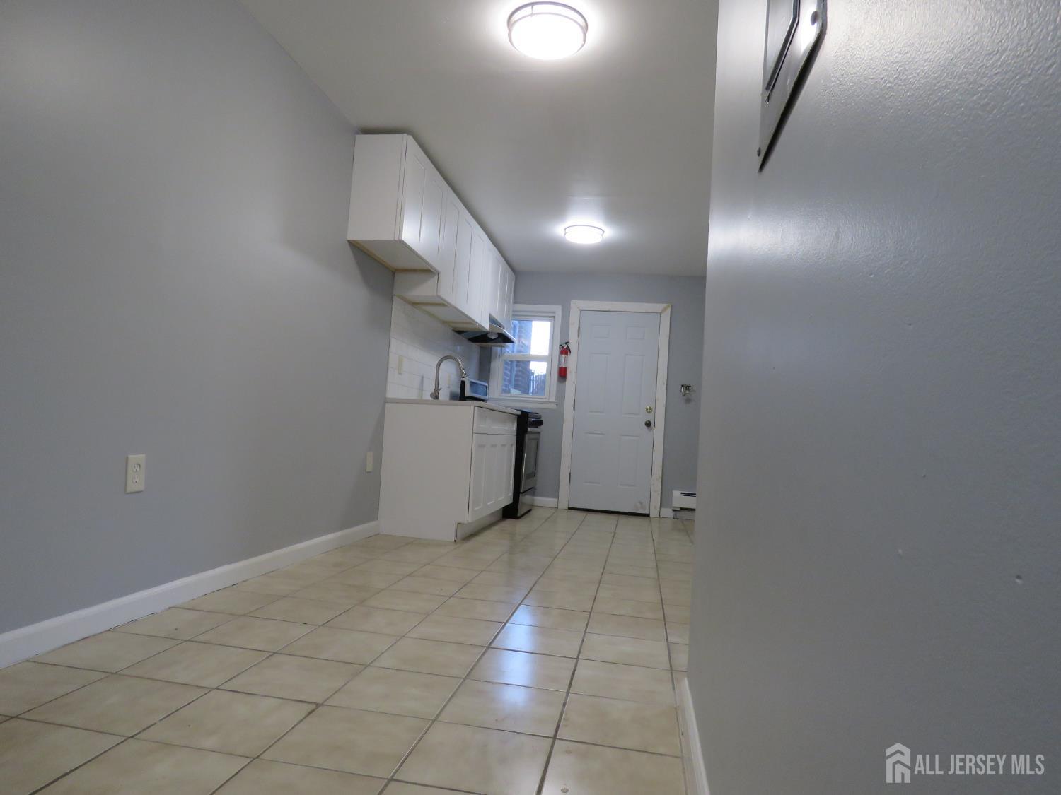 768 State Street Perth Amboy, NJ 08861 - Photo 10 of 35 a view of an empty room