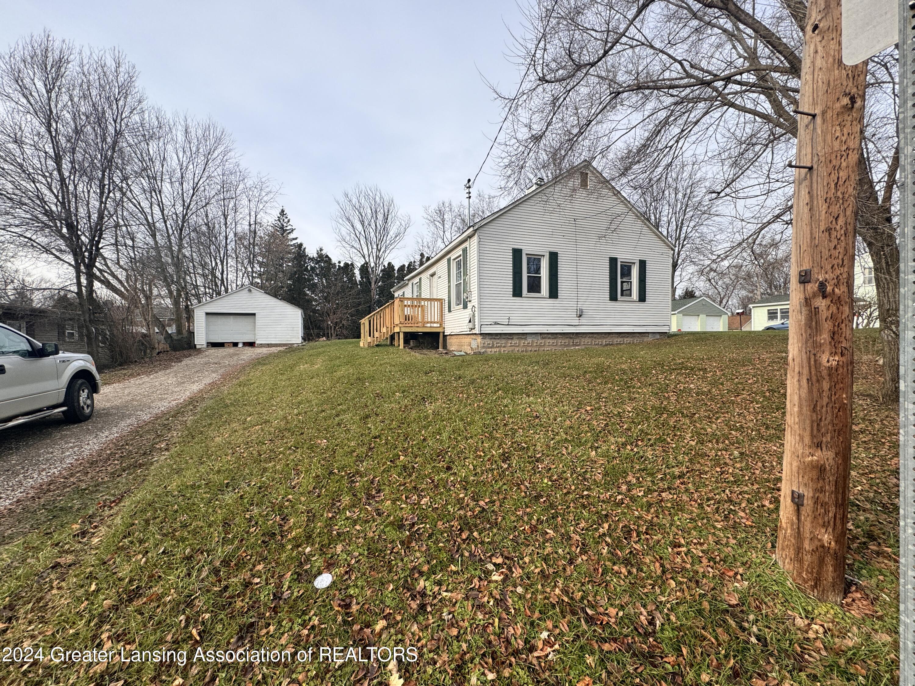 6006 Hilliard Road Lansing, MI 48911 - Photo 1 of 23 front