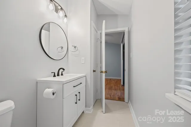 a view of a two chairs in the balcony