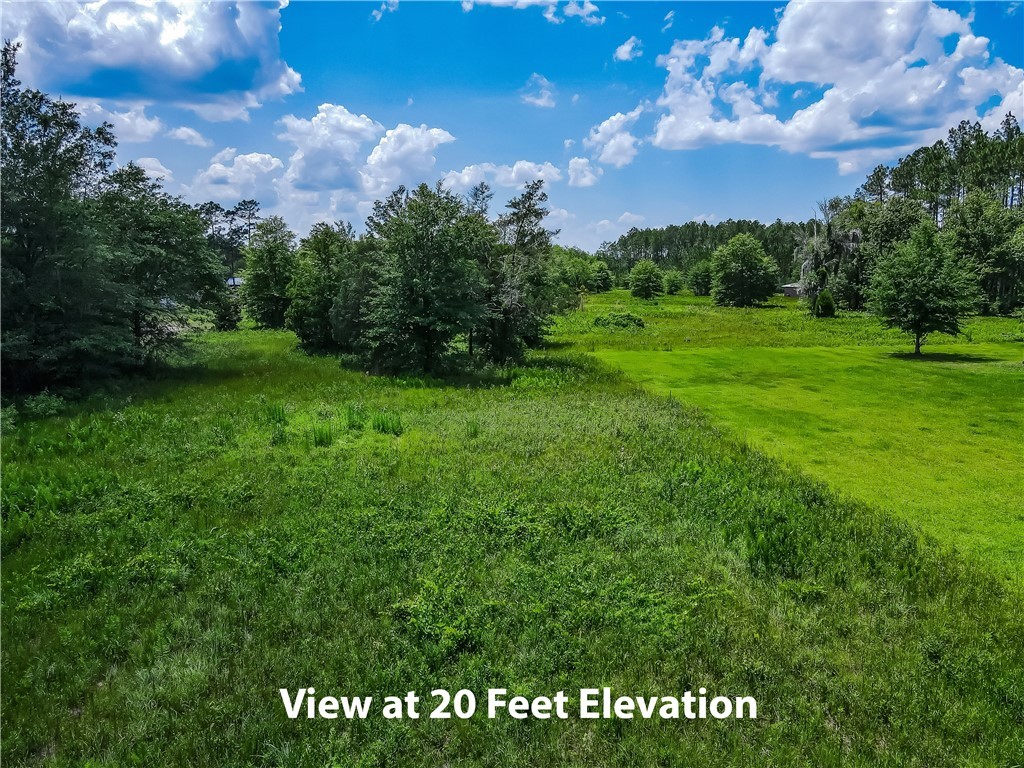108 County Road Hilliard, FL 32046 - Photo 12 of 16 a view of a golf course with a house