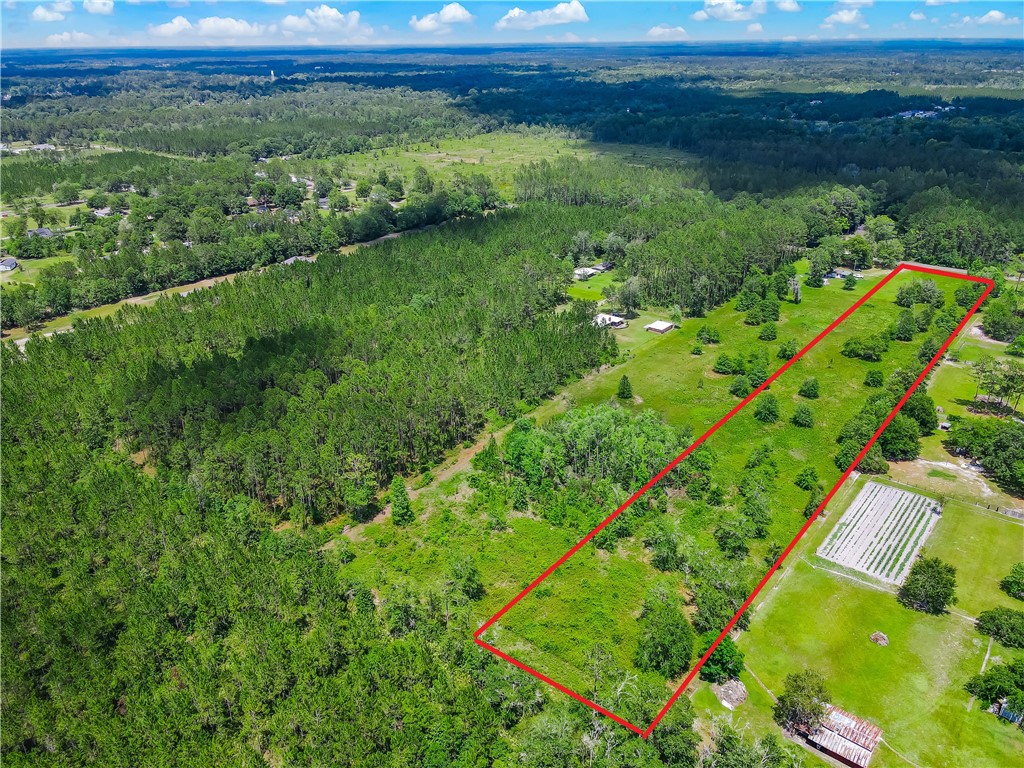 108 County Road Hilliard, FL 32046 - Photo 16 of 16 a view of a garden with an outdoor space