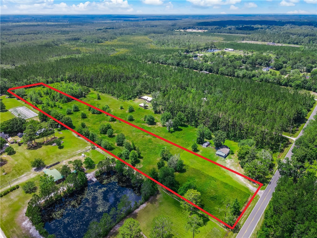 108 County Road Hilliard, FL 32046 - Photo 3 of 16 a view of an outdoor space