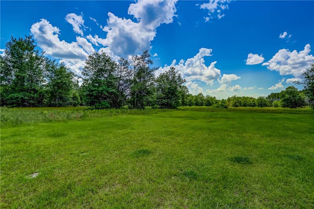 108 County Road Hilliard, FL 32046 - Photo 8 of 16 a view of a golf course with a house