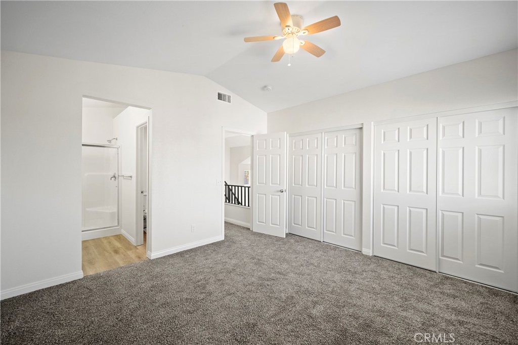 33034 Romero Drive Temecula, CA 92592 - Photo 17 of 21 an empty room with closet and a ceiling fan