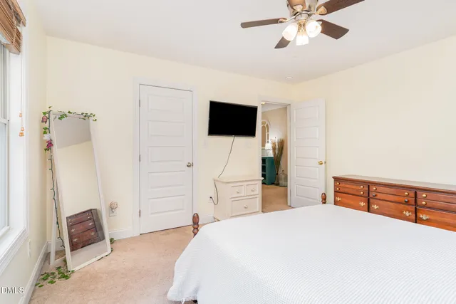 an empty room with fan