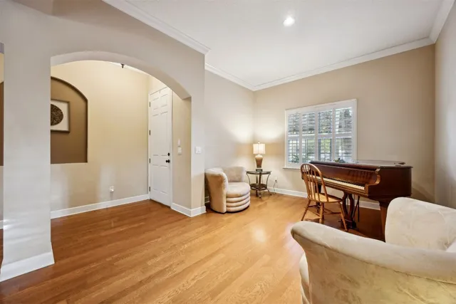 a kitchen with stainless steel appliances granite countertop a sink a stove and cabinets