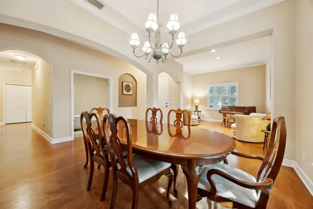 a bed room with a bed and a dresser