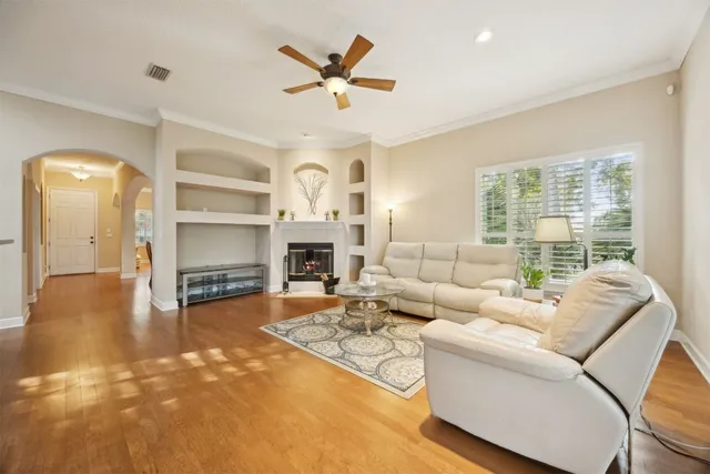 a bathroom with a tub sink shower and mirror