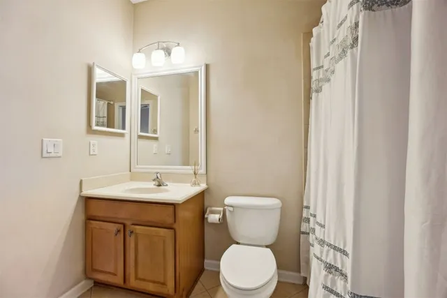 a view of a swimming pool with a yard and seating area