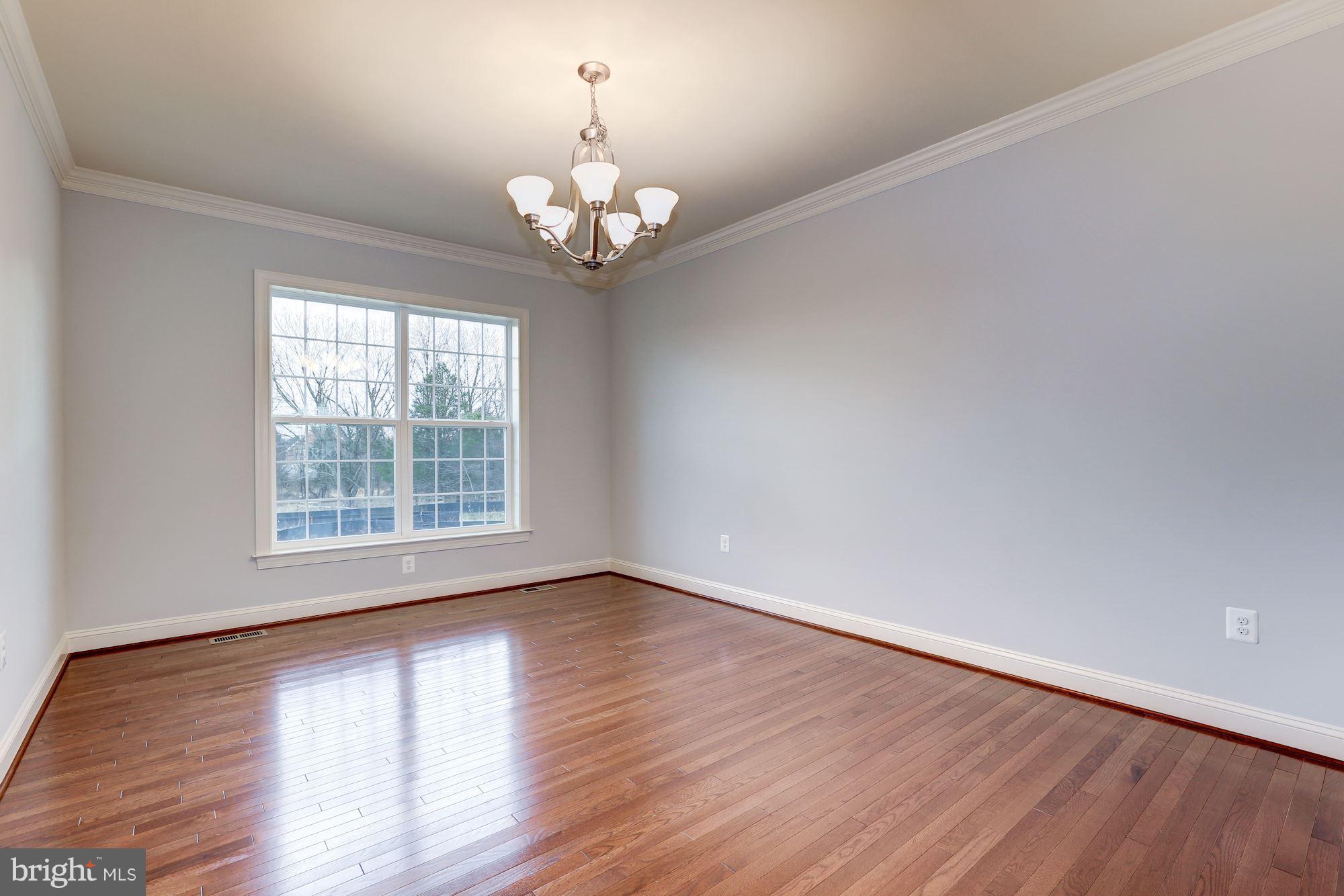 17005 Bennett Way Poolesville, MD 20837 - Photo 10 of 27 Dining room with solid oak flooring.