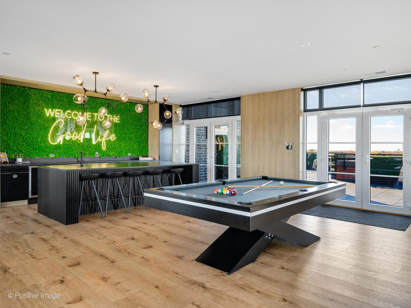 11 West Prospect Avenue, Unit 214 Mount Prospect, IL 60056 - Photo 13 of 32 a room with furniture pool table and windows