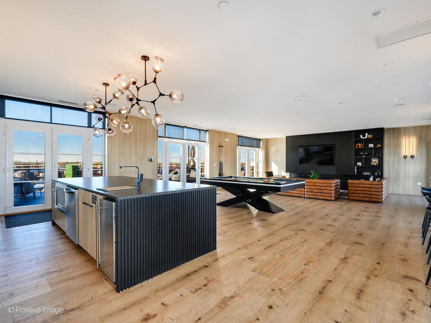 11 West Prospect Avenue, Unit 214 Mount Prospect, IL 60056 - Photo 15 of 32 a living room with furniture and a flat screen tv