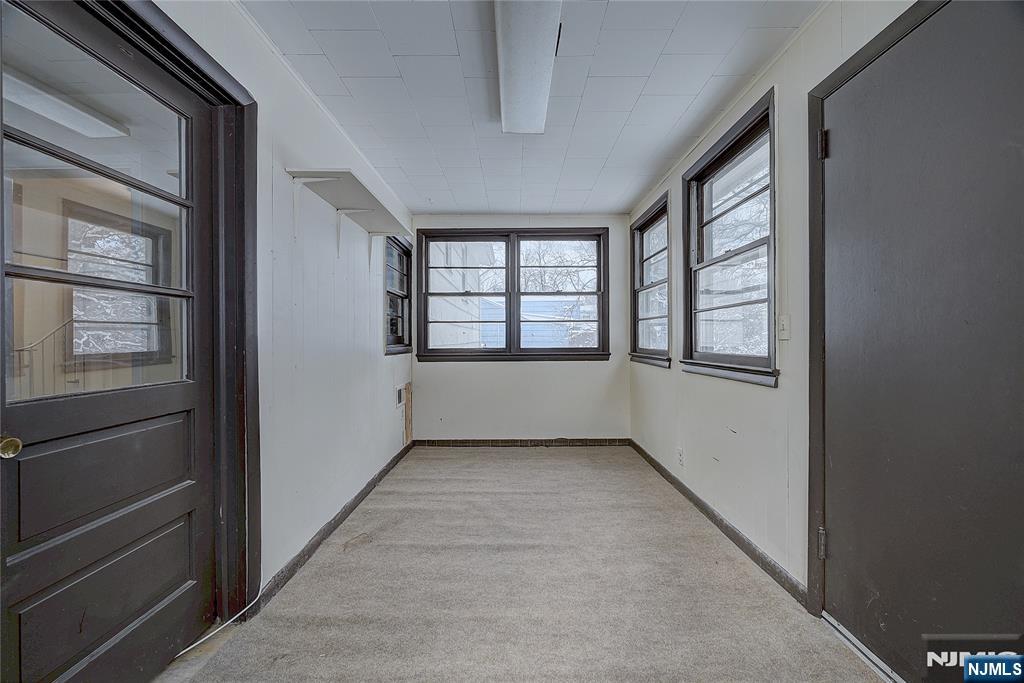 27 Old Short Hills Road West Orange, NJ 07052 - Photo 12 of 35 a view of an empty room with a window