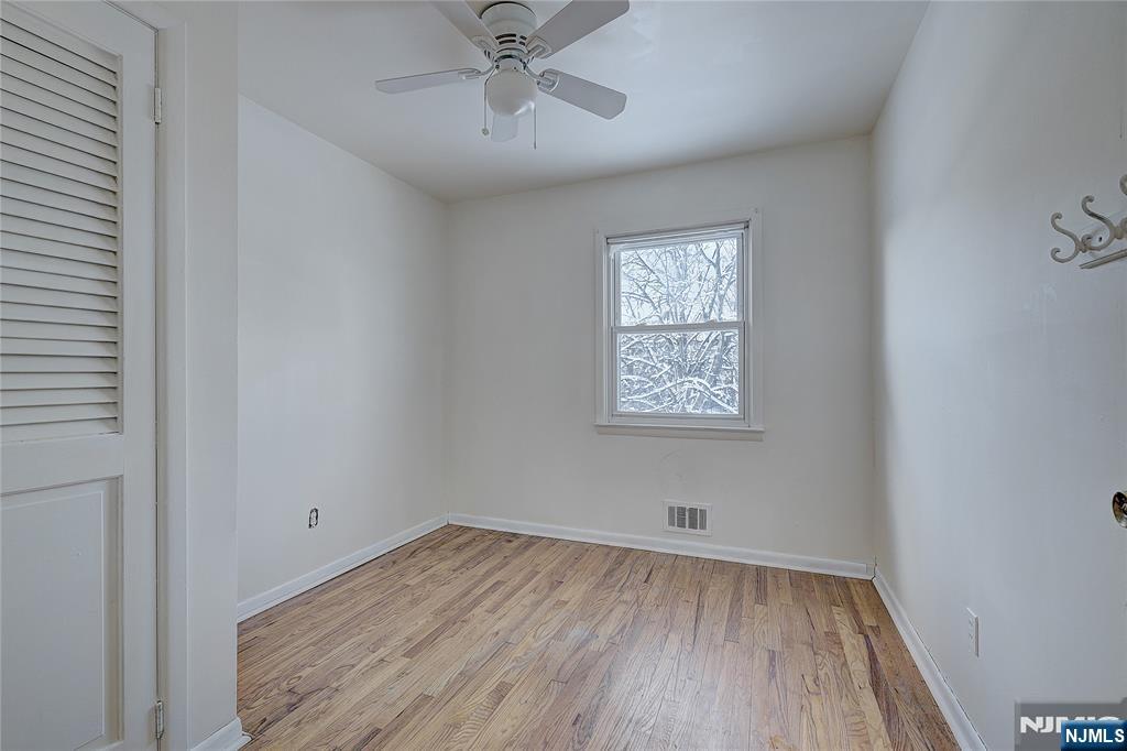 27 Old Short Hills Road West Orange, NJ 07052 - Photo 18 of 35 wooden floor in an empty room with a window