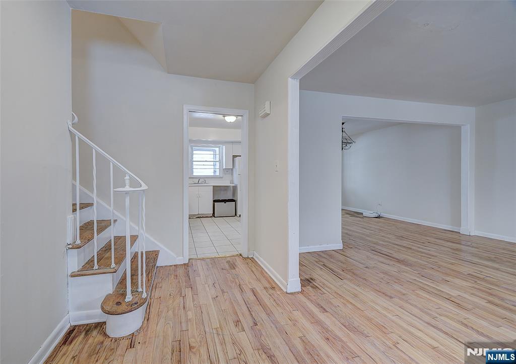 27 Old Short Hills Road West Orange, NJ 07052 - Photo 2 of 35 a view of entryway and hall with wooden floor