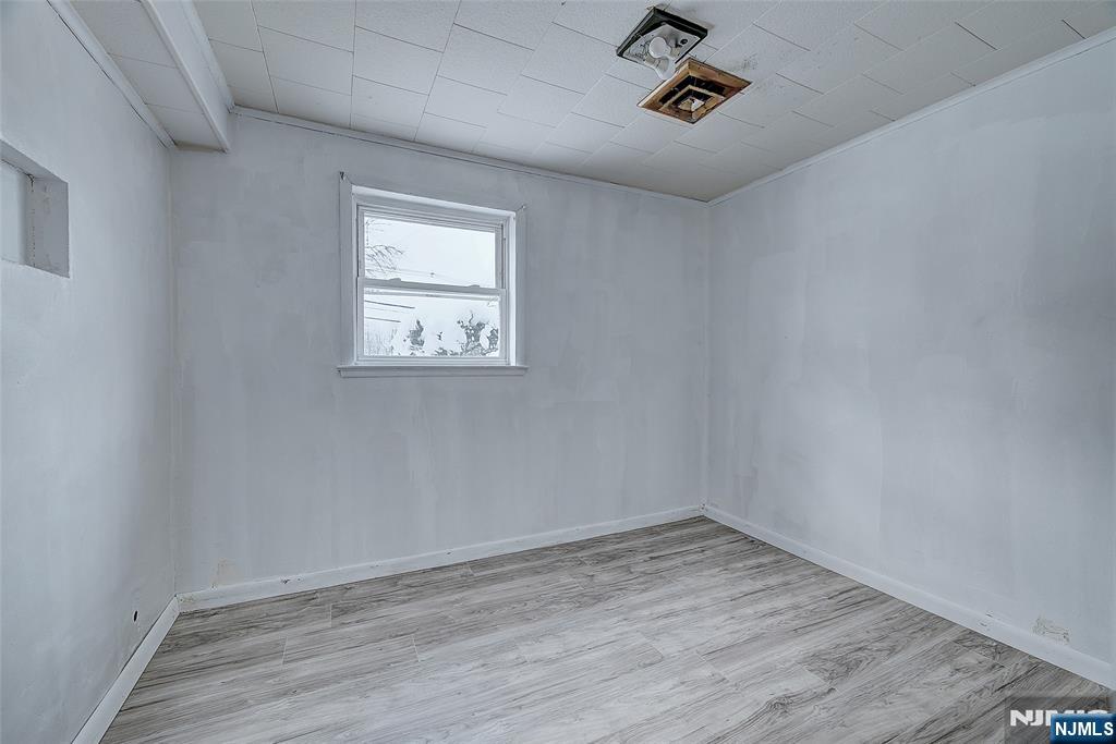 27 Old Short Hills Road West Orange, NJ 07052 - Photo 25 of 35 an empty room with a window