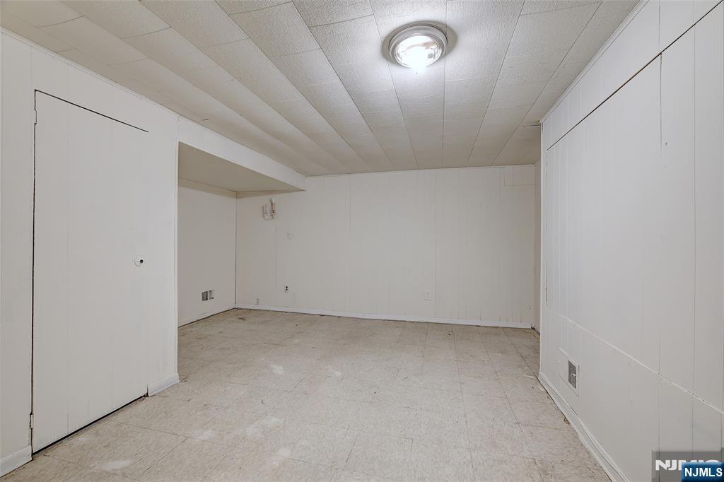27 Old Short Hills Road West Orange, NJ 07052 - Photo 27 of 35 an empty room with a empty space and a window