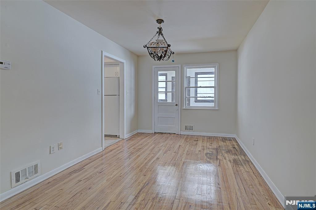 27 Old Short Hills Road West Orange, NJ 07052 - Photo 6 of 35 wooden floor in an empty room with a window
