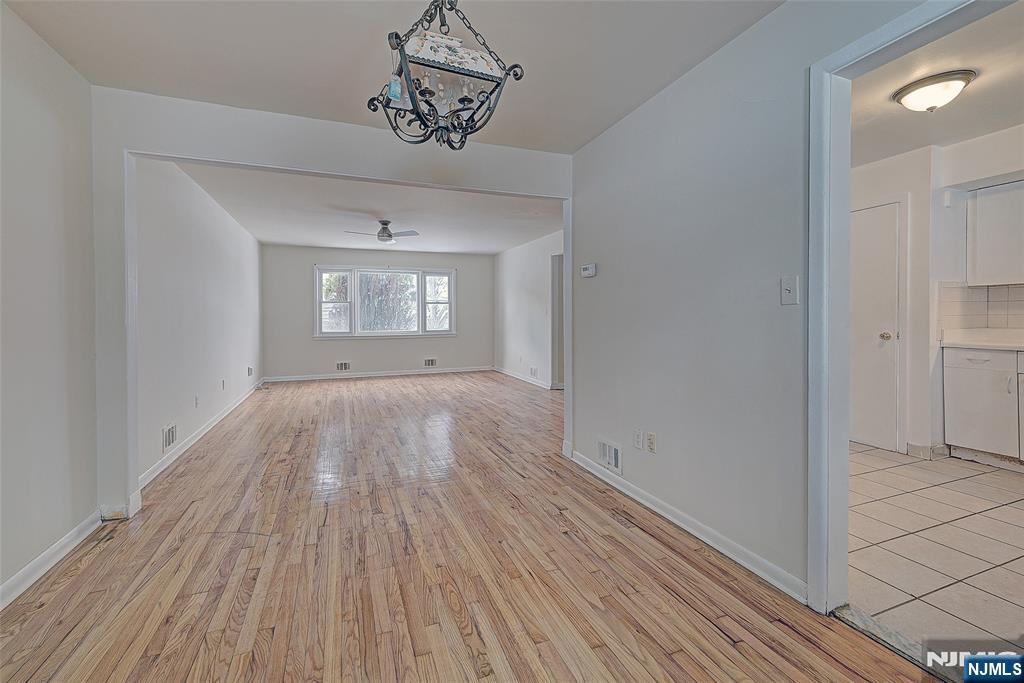 27 Old Short Hills Road West Orange, NJ 07052 - Photo 7 of 35 wooden floor in an empty room with a window