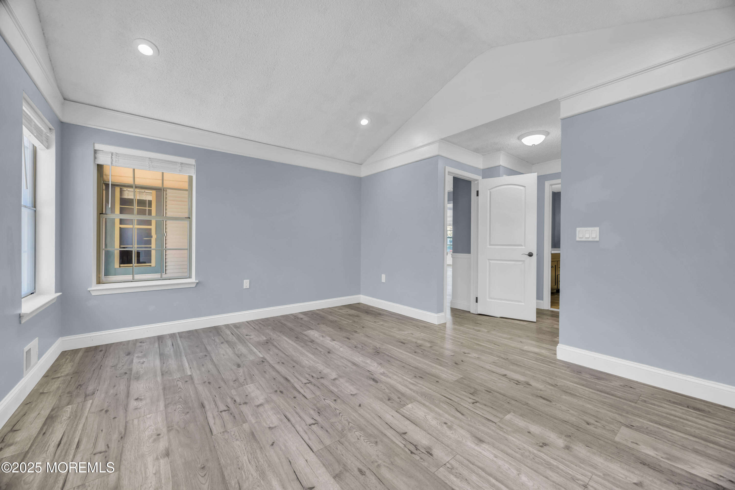 12 Thatcher Court Jackson, NJ 08527 - Photo 18 of 50 wooden floor in an empty room with a window