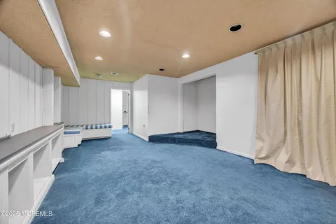 en view of an empty room with a window