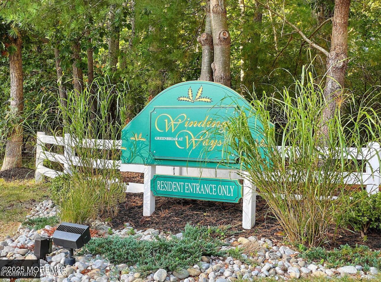 12 Thatcher Court Jackson, NJ 08527 - Photo 44 of 50 a sign that is sitting in front of a brick building