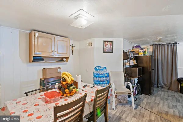 a bedroom with furniture and a book shelf
