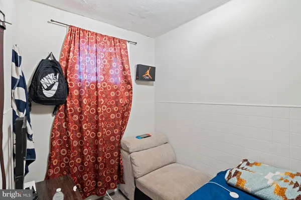 a view of small space with racks on the wall