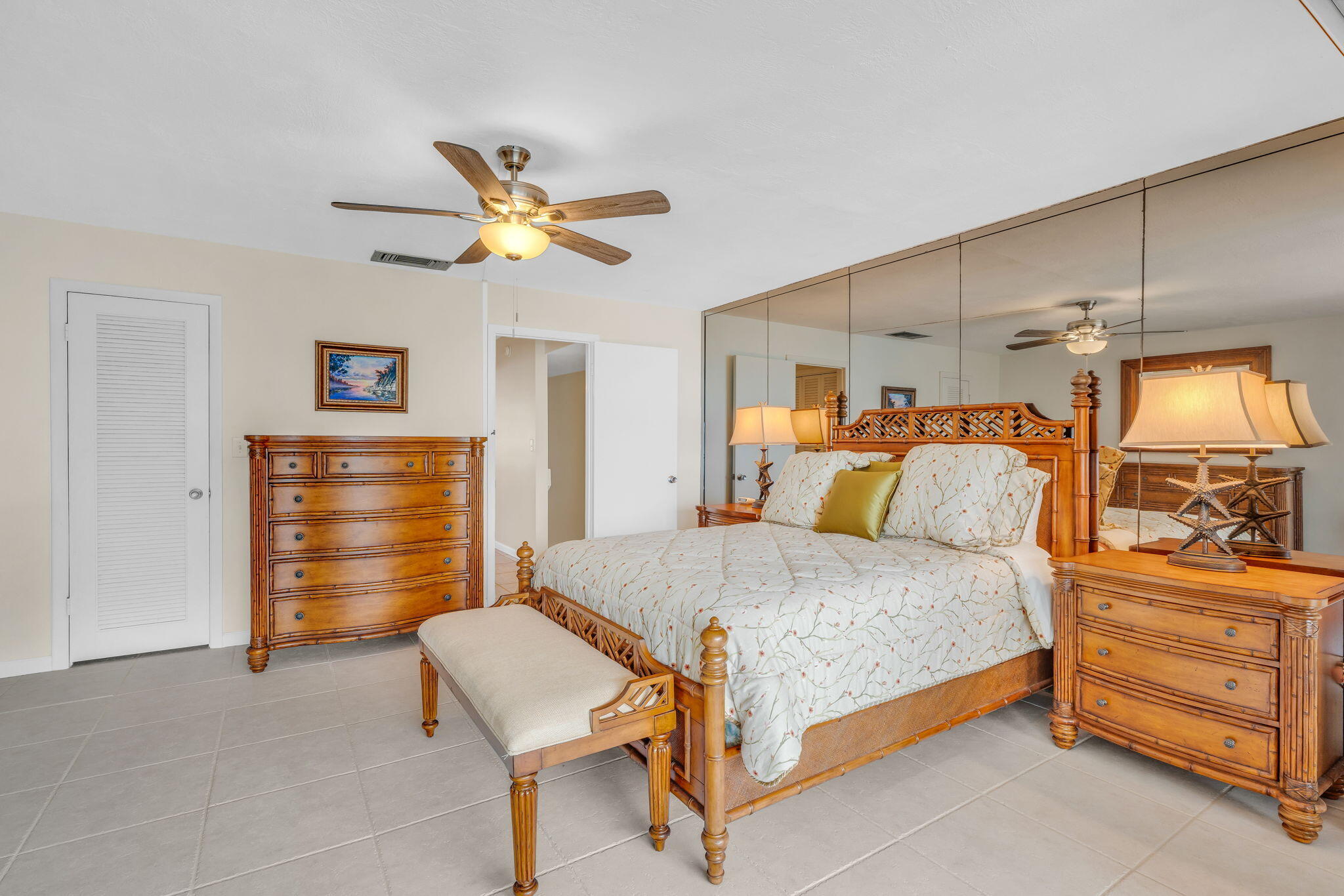 97652 Overseas Highway, Unit P6 Key Largo, FL 33037 - Photo 31 of 79 a bedroom with a bed and furniture