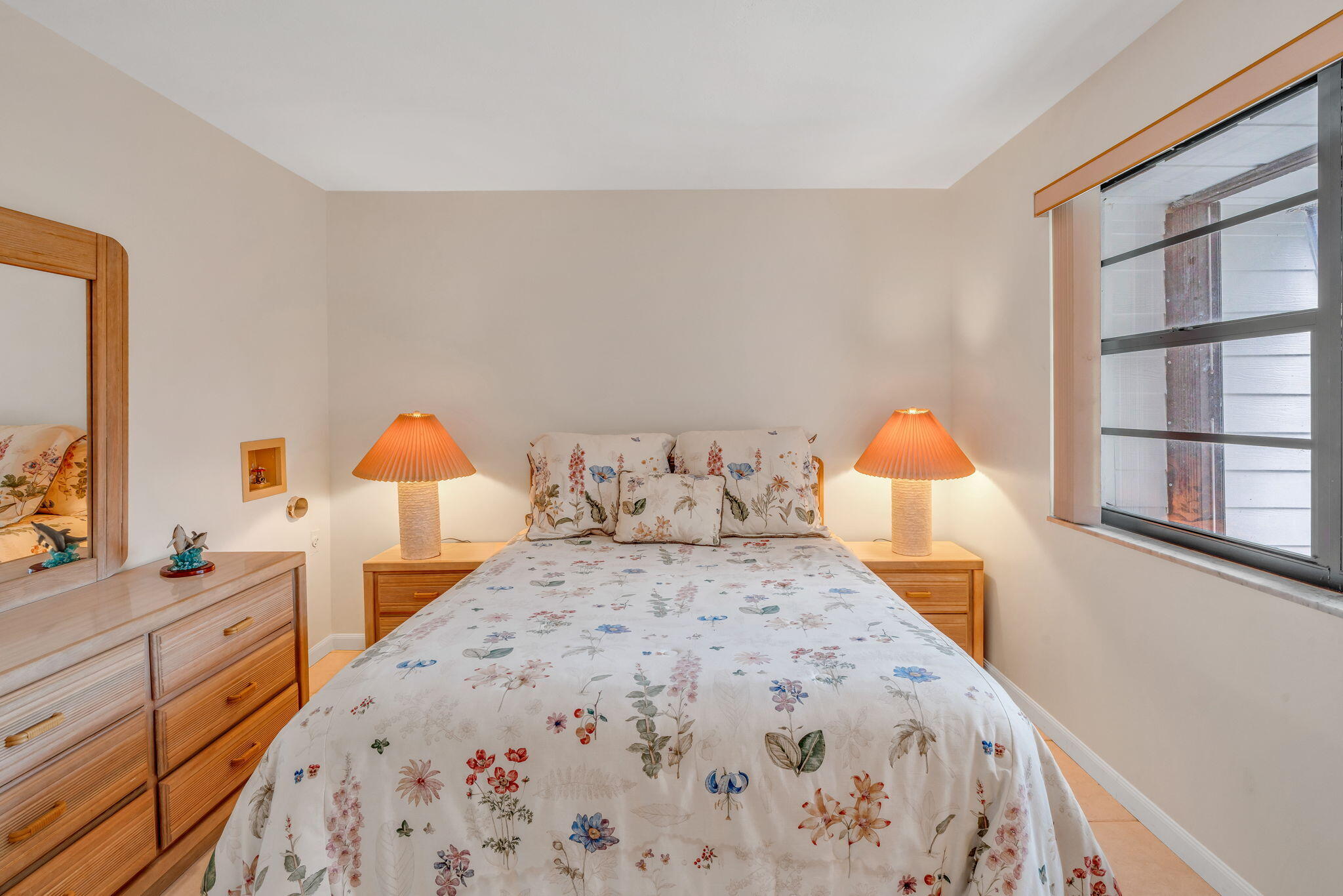 97652 Overseas Highway, Unit P6 Key Largo, FL 33037 - Photo 38 of 79 a bed room with a bed and a night stand