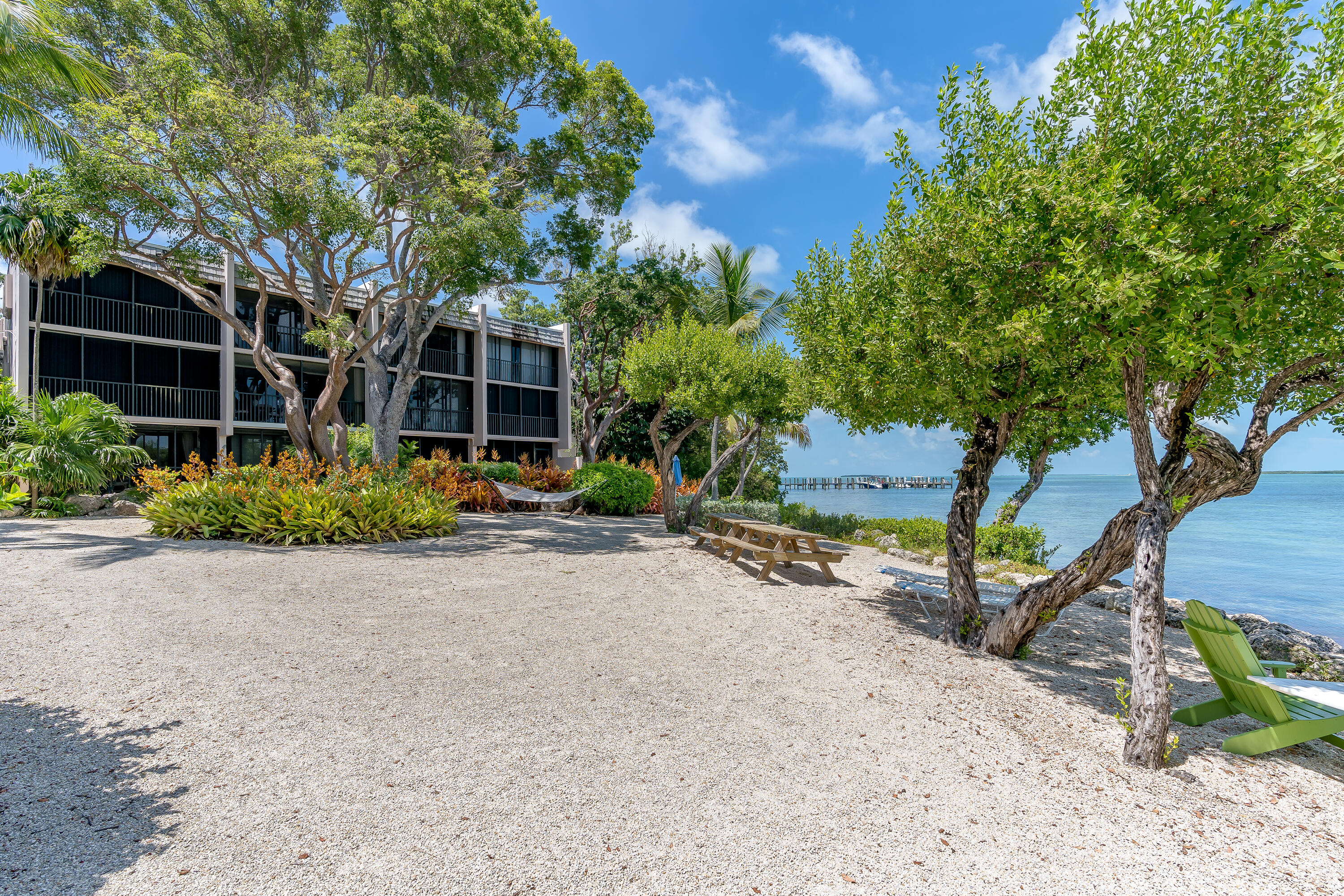 97652 Overseas Highway, Unit P6 Key Largo, FL 33037 - Photo 67 of 79 a front view of a house with garden
