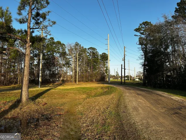 a view of a playground with basketball court