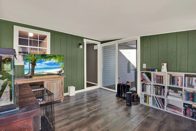 a view of a workspace with furniture and toys