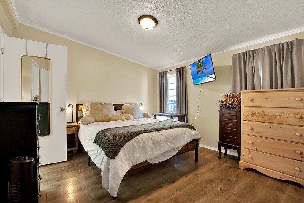 123 Laura Lane Elizabeth, PA 15037 - Photo 25 of 27 a bed room with a bed and a tv