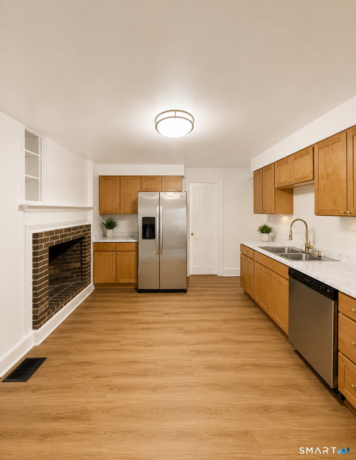 493 High Street Milford, CT 06461 - Photo 1 of 10 a kitchen with stainless steel appliances granite countertop a stove a sink and a refrigerator