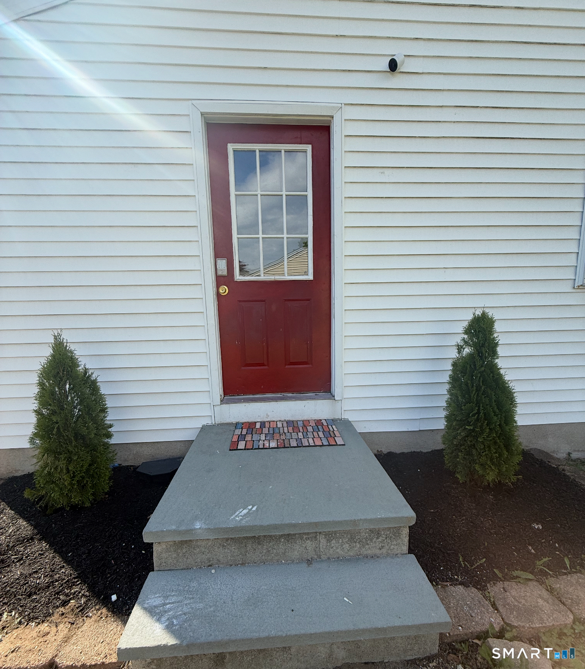 493 High Street Milford, CT 06461 - Photo 8 of 10 a view of a entryway door front of house