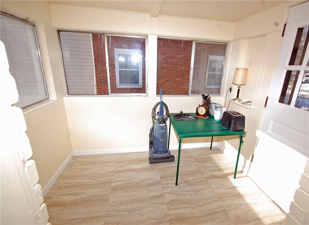 1955 Spring Valley Road Pittsburgh, PA 15243 - Photo 6 of 14 Enclosed side porch makes a great breakfast nook.