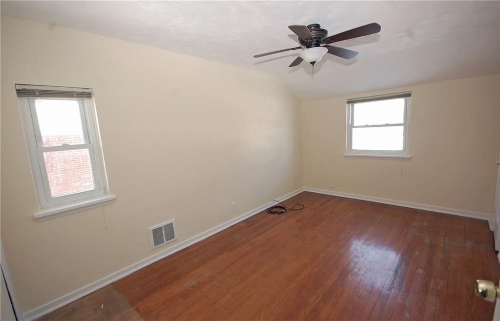 1955 Spring Valley Road Pittsburgh, PA 15243 - Photo 8 of 14 Master bedroom with overheard ceiling fan and light.
