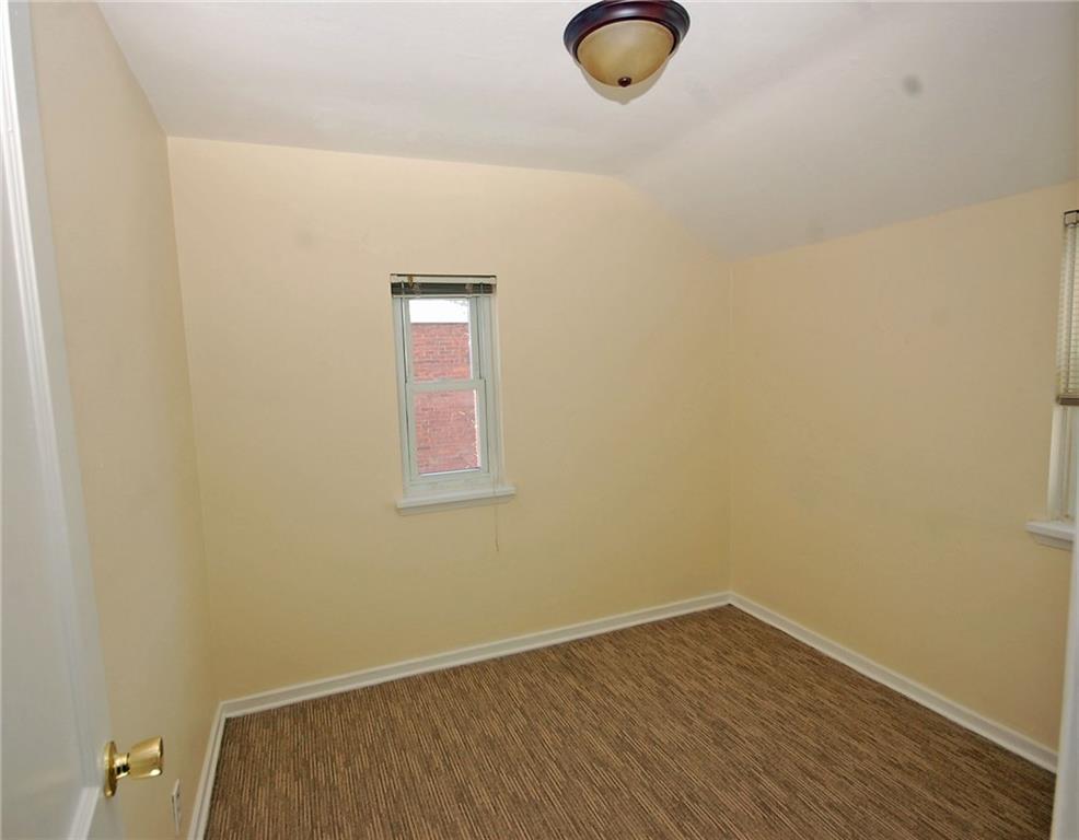 1955 Spring Valley Road Pittsburgh, PA 15243 - Photo 9 of 14 Third bedroom with fresh paint and newer carpeting.