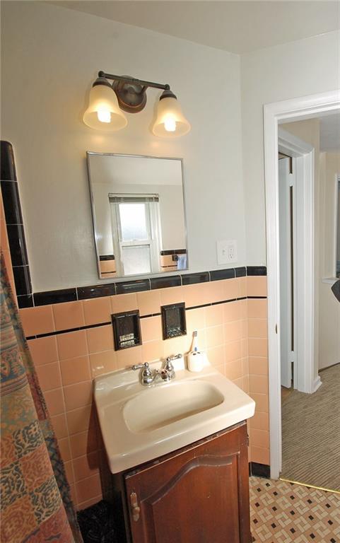 1955 Spring Valley Road Pittsburgh, PA 15243 - Photo 10 of 14 Newer light fixture and medicine cabinet in bath.